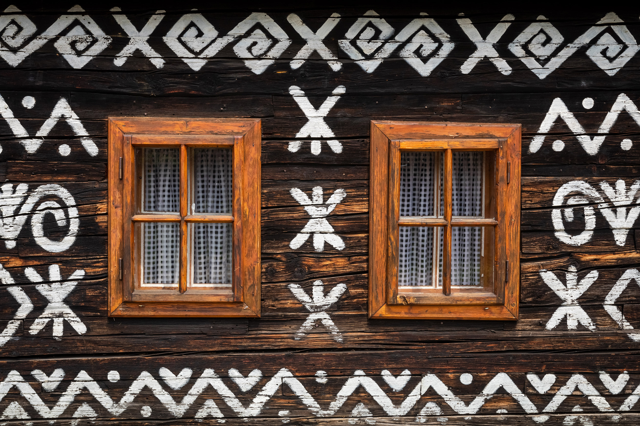 Old wooden houses in Slovakia UNESCO village Cicmany. The orname