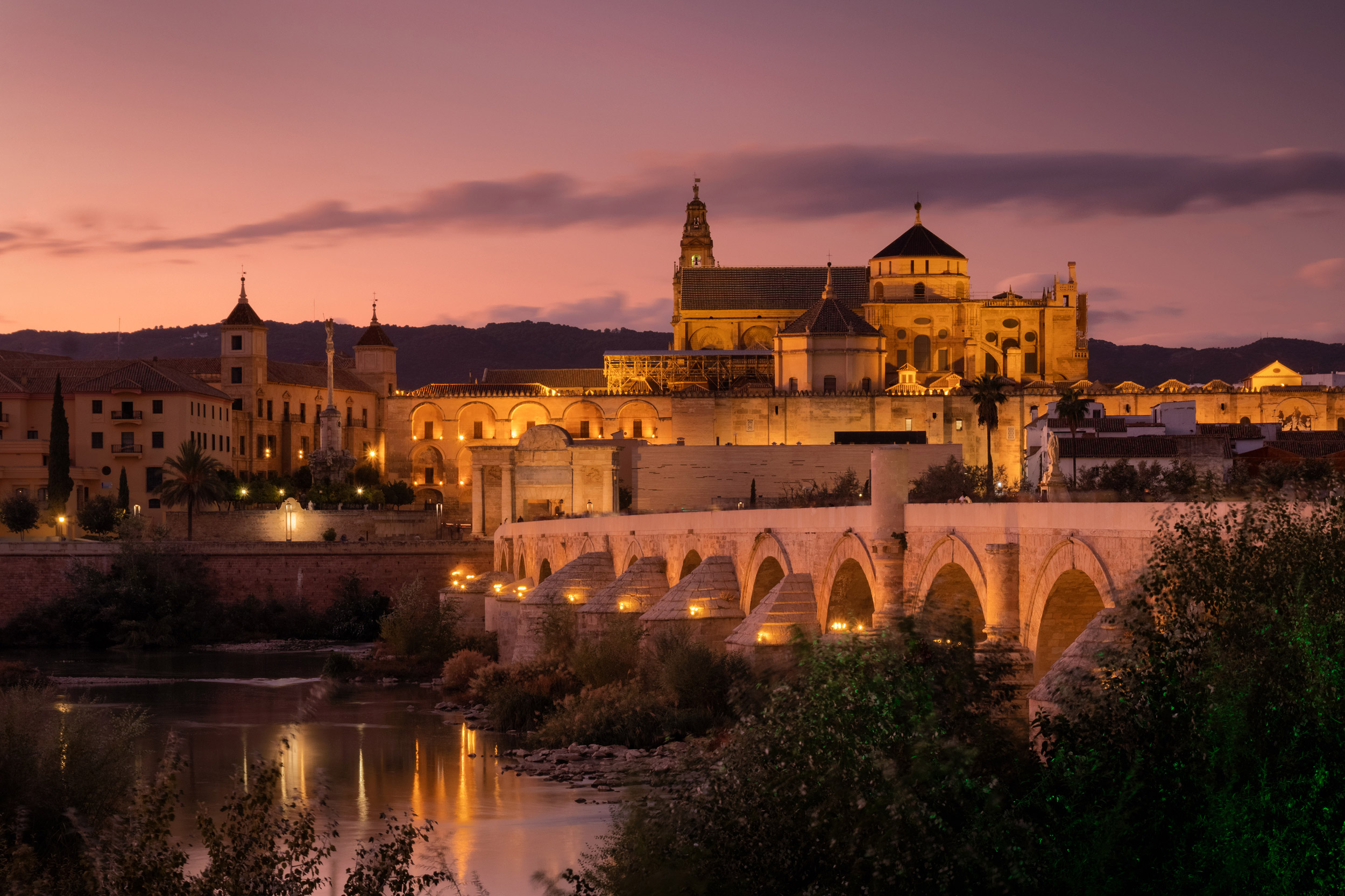 Roman Bridge and Guadalquivir river after the sunset, Great Mosq