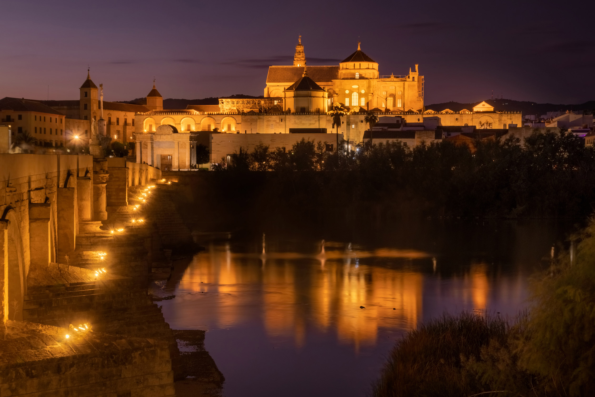 Roman Bridge and Guadalquivir river after the sunset, Great Mosq