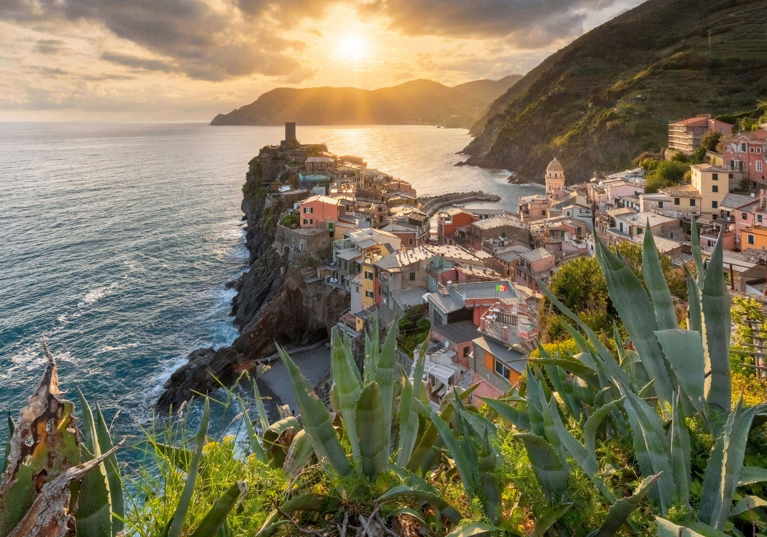 View of the beautiful sunset seaside of Vernazza village in summ