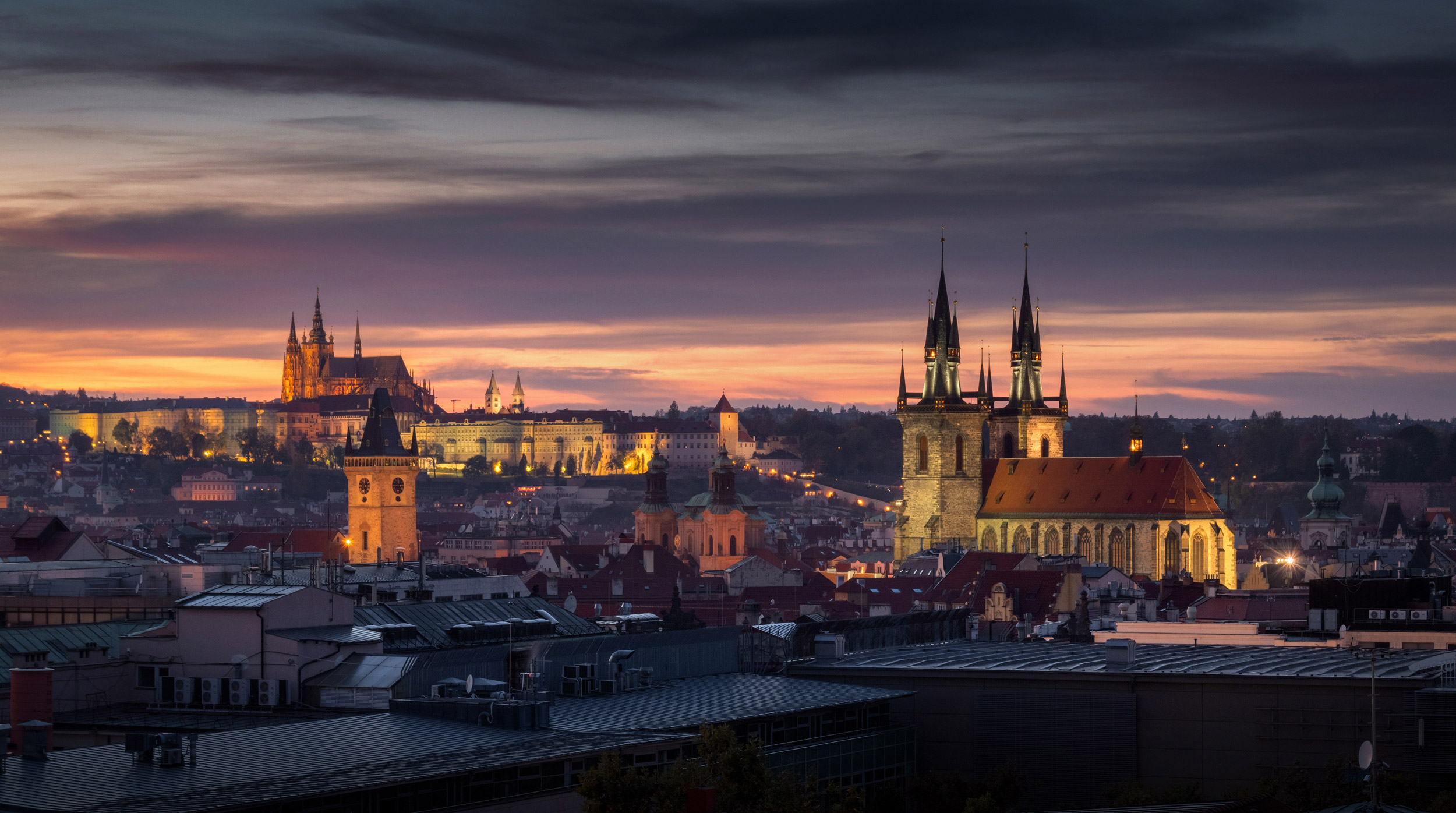 Beautiful sunset view on city of Prague at the sunset from Jindr