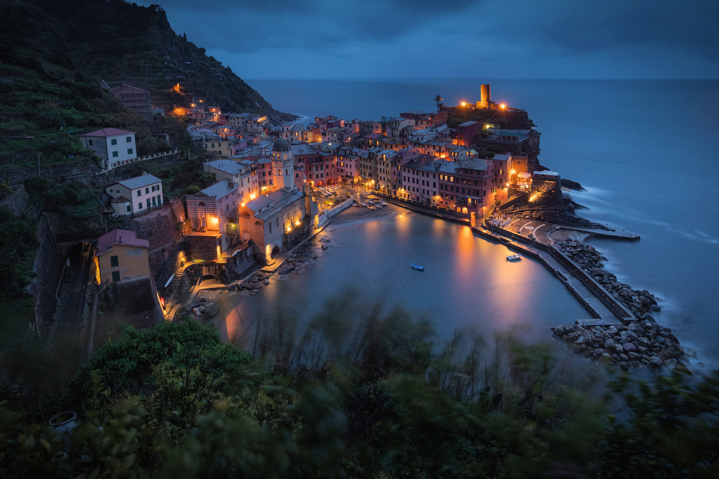Illuminated Vernazza village in Cinque Terre National Park at ni